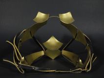 Blinders, brass and leather.  7"x 6"x 7"